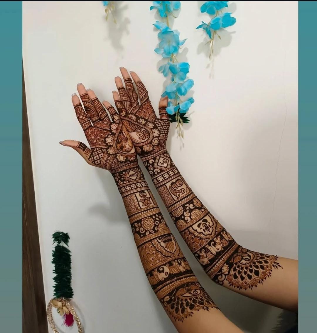 Traditional bridal mehndi design on hands