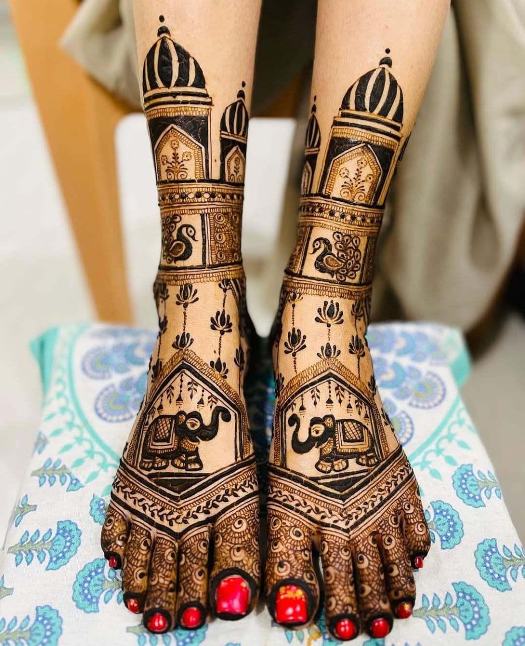Intricate mehndi design on bride's hands and wrists