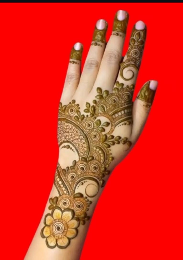 Arabic Mehndi design with intricate paisley patterns