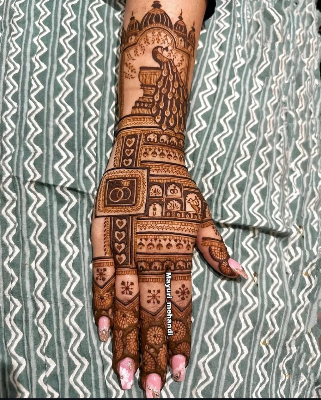 Engagement Mehndi design with intricate paisley patterns