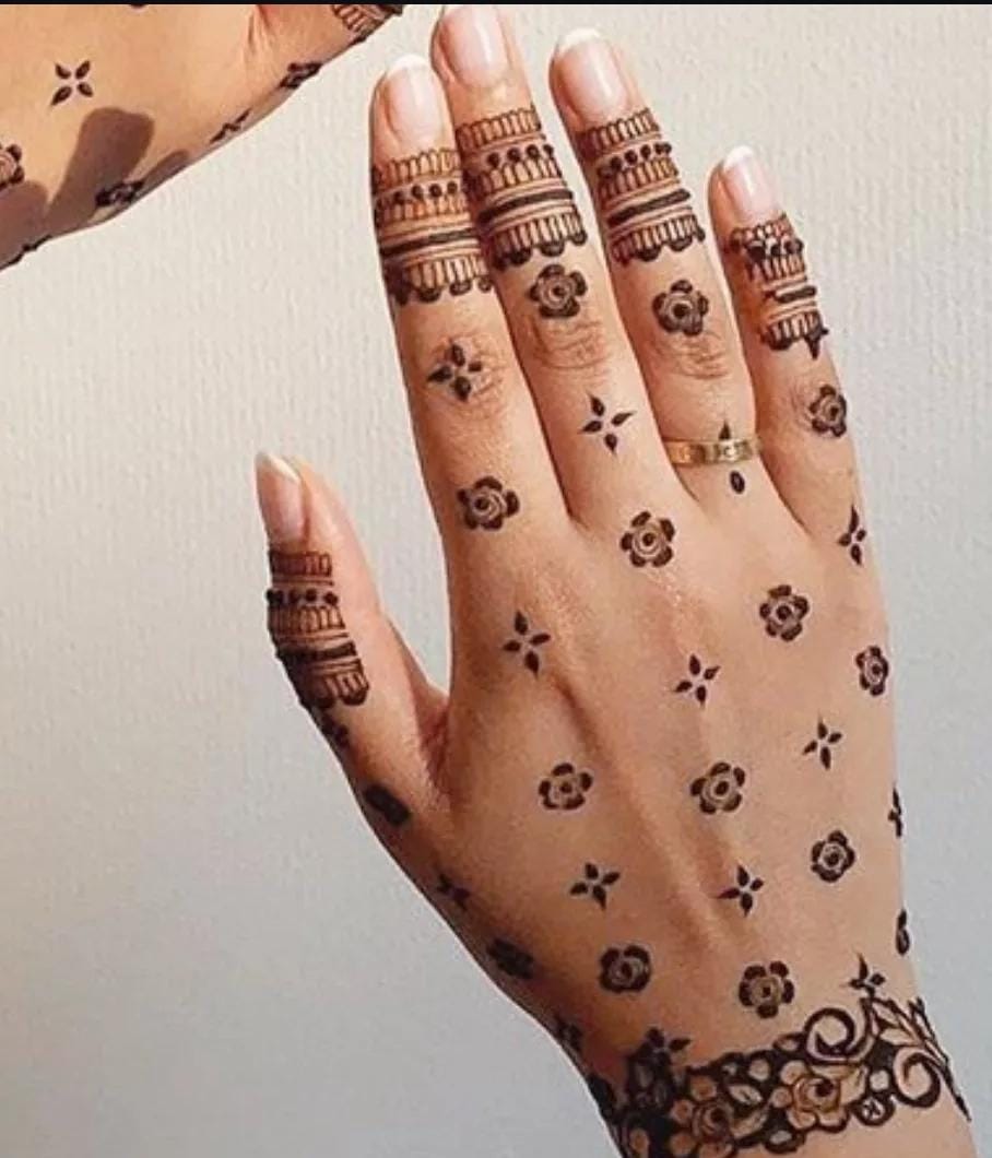 Engagement Mehndi design with intricate mandala patterns
