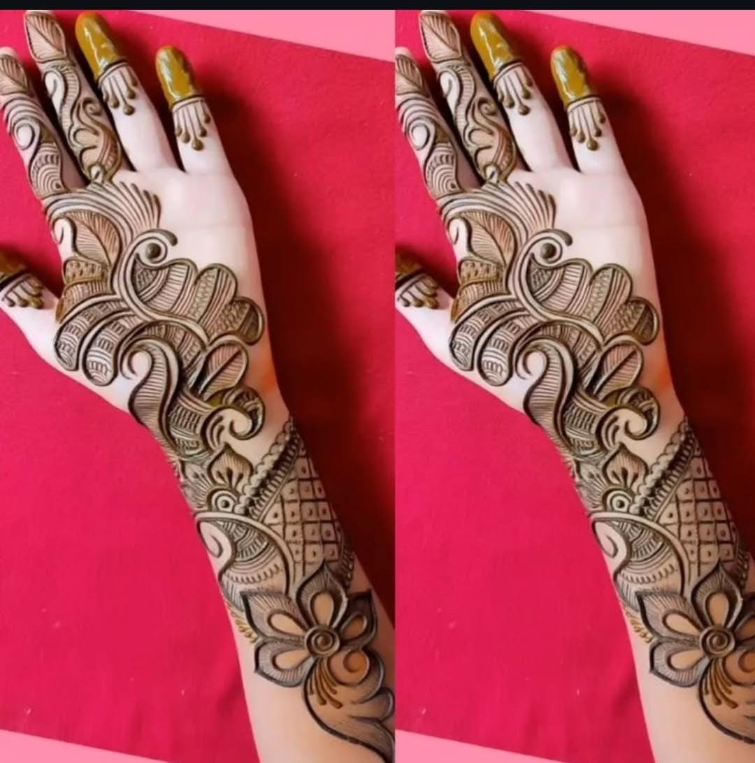 Intricate Sangeet Mehndi design with musical instrument motifs