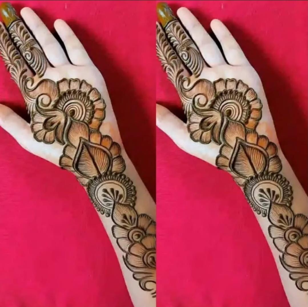 Sangeet & Haldi Mehndi design with intricate paisley patterns